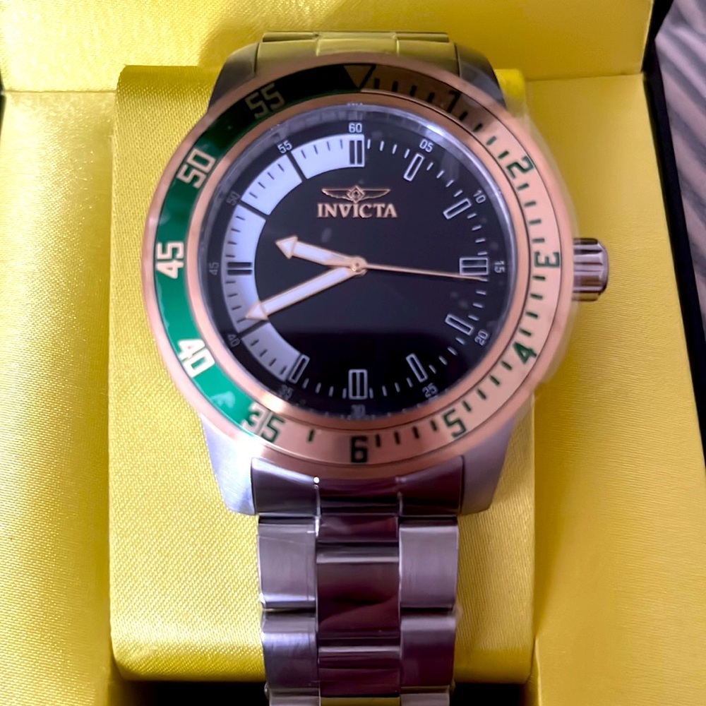 Beautiful green and silver watch from Invicta , never even worn